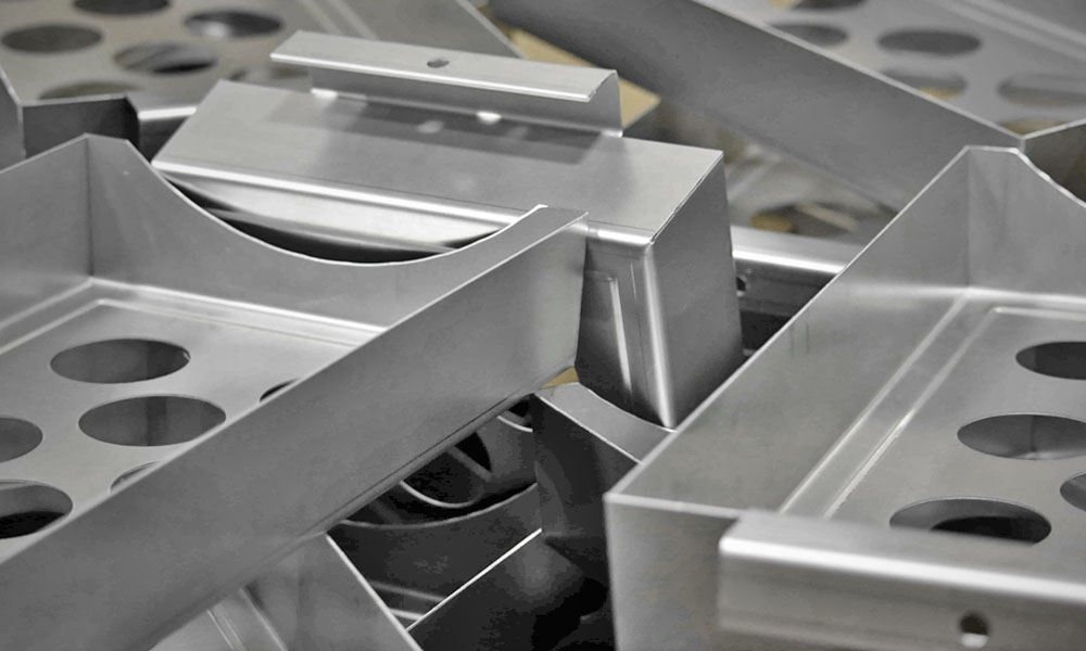 What Is Metal Stamping? Process, Benefits & Common Applications metalworking lubricant - Anchor Lubricants
